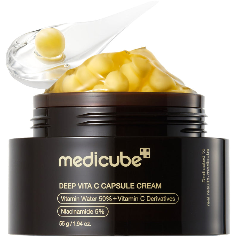 Pot de la crème Medicube Deep Vita C Capsule Cream, 55 g, avec ses capsules de vitamine C