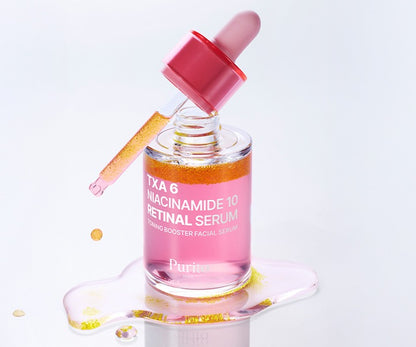 Sérum Purito Seoul TXA 6 Niacinamide 10 Retinal Serum avec sa pipette et une goutte de produit